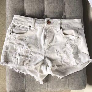 Ripped white jean shorts